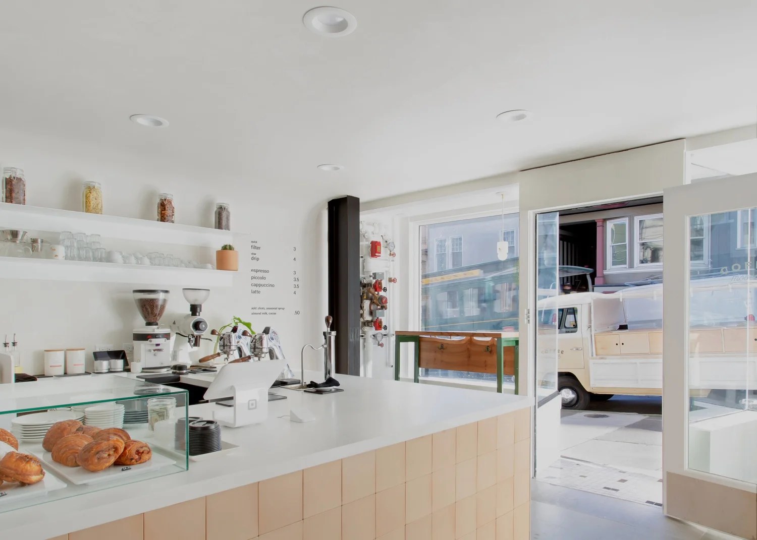 The tiled counter and pastry case at The Coffee Movement